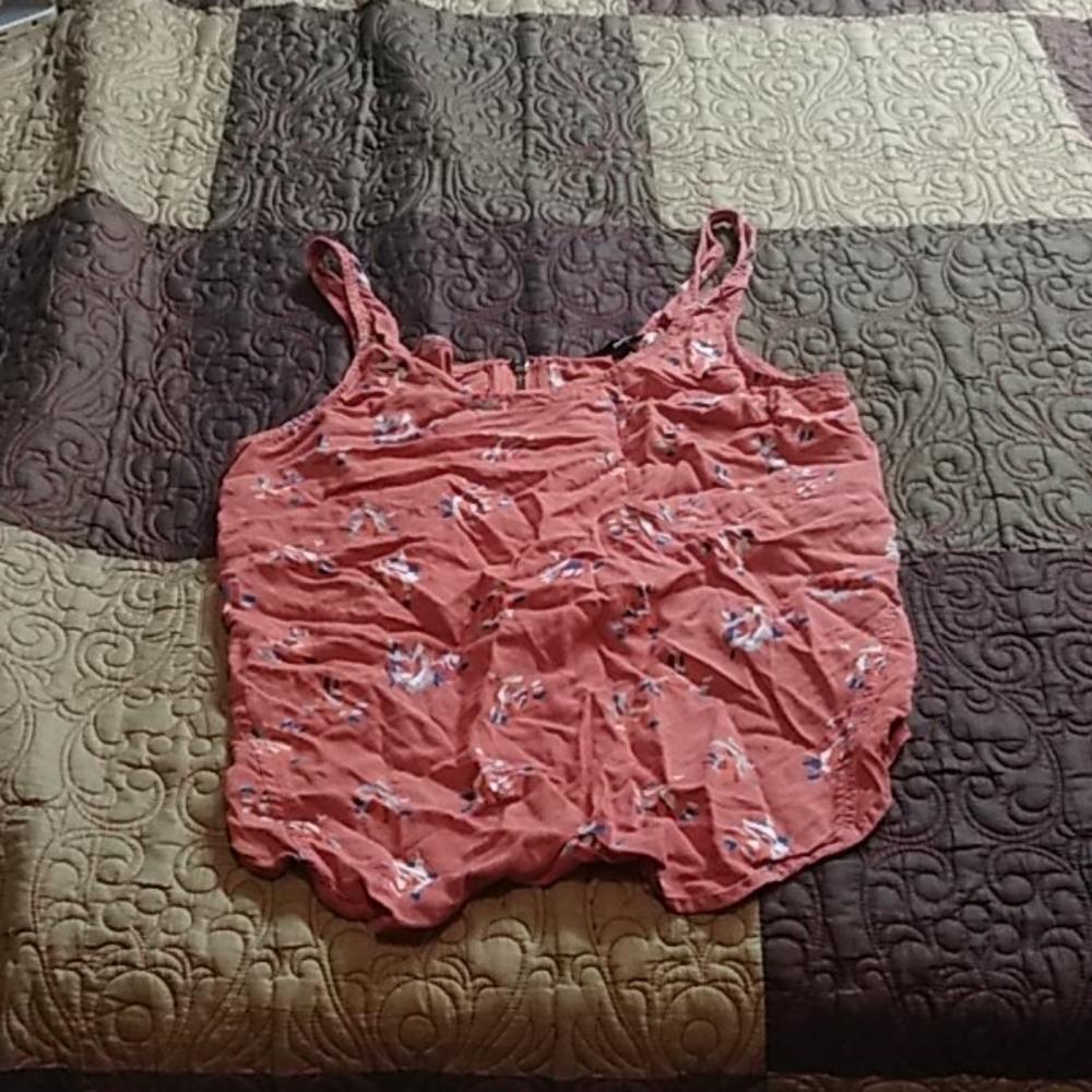 A burnt salmon colored croptop